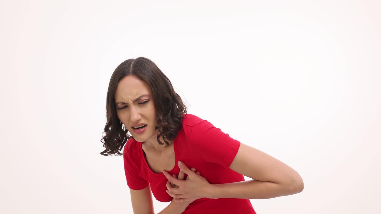 Woman Experiencing Chest Pain or Heart Attack Symptoms