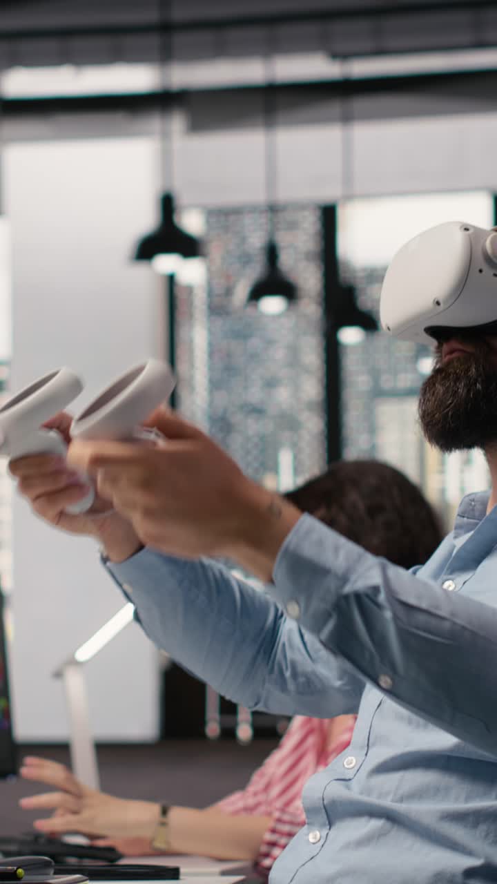 Man Wearing VR Headset and Using Controllers in Modern Office
