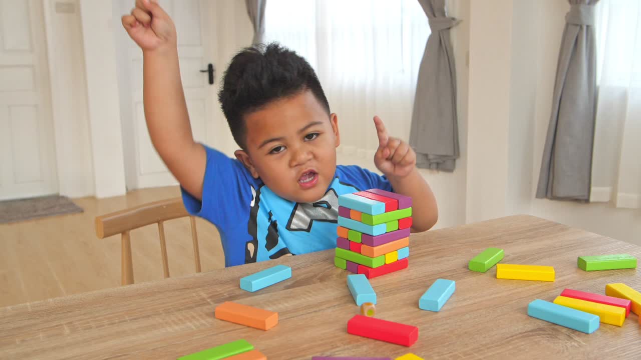 Little Boy Dancing With Color Wood Block Tower Game, Slow Motion
