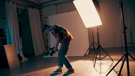 photographer in a vibrant studio setting
