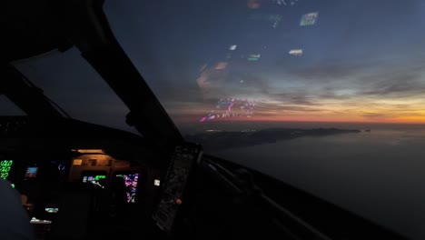 Aerial-view-of-Mallorca-island,-Spain,-shot-from-an-airplane-cockpit-after-sunset