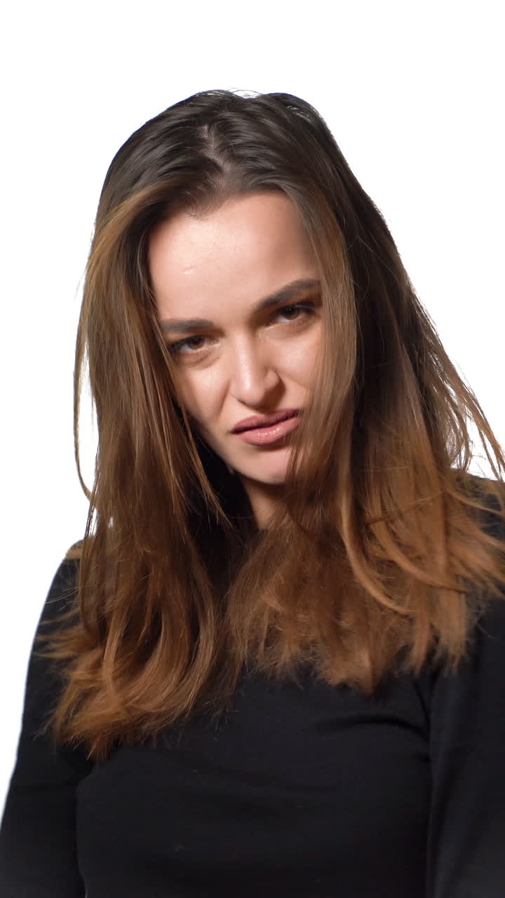 Shopping woman holding bags, isolated on white studio background. Lifestyle. People concept Vertical video