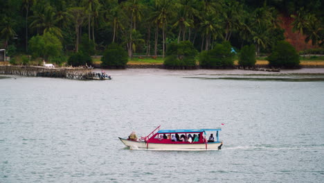 muslim passengers travelling on a traditional boat