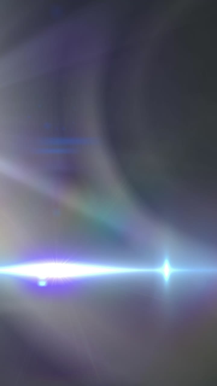 animación de focos con destello de la lente y haces de luz que se mueven sobre un fondo oscuro