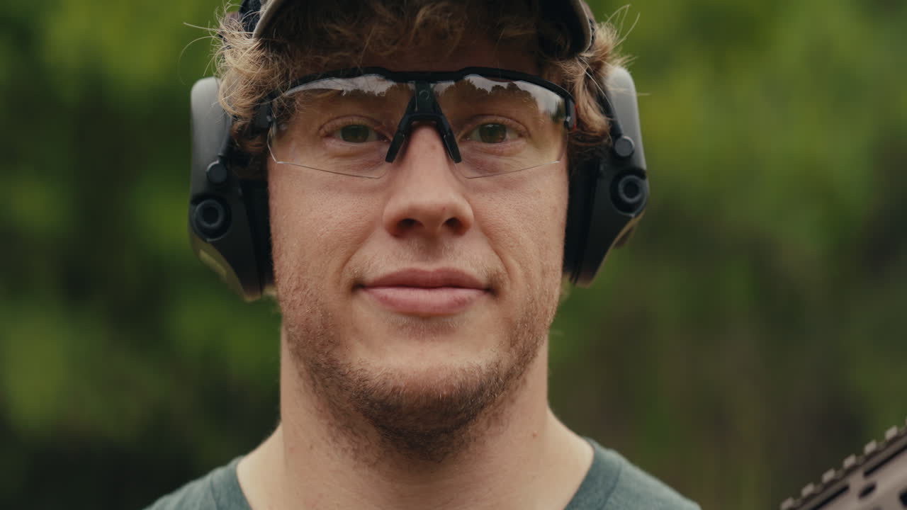 Man with safety glasses and ear protection