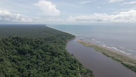 low flight toward river bar on east coast of costa rica at tortuguero