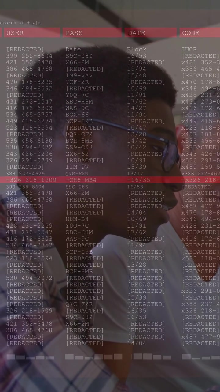 Vertical video: Lead dev leaning, gesturing, peer watching security overlay appearing with red scan