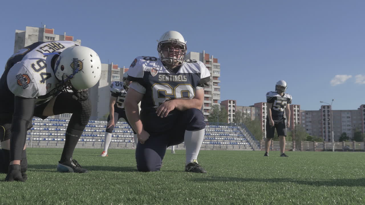 Giocatori di football americano in allenamento