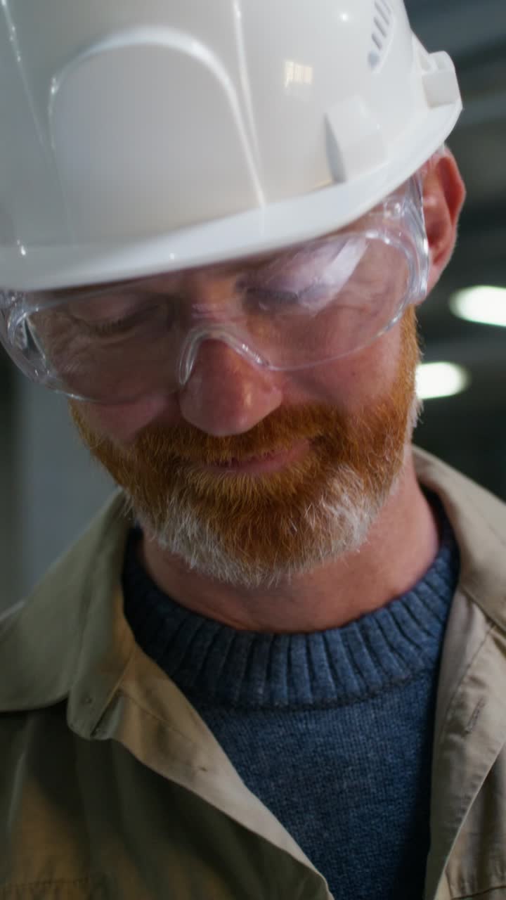 Worker using Tablet and Hard Hat