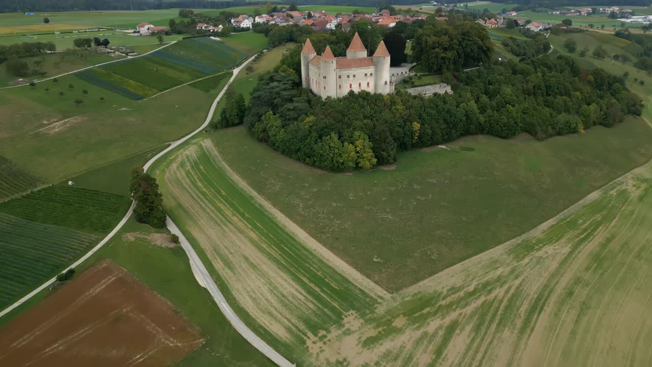 Reveal drone shot of Champvent Castle near Yverdon-les-Bains in Canton of Vaud in Switzerland.