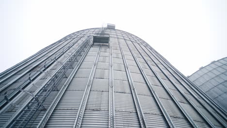big storage elevator construction. steel hude agricultural storage for farming.