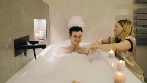 couple relaxing in a bubble bath