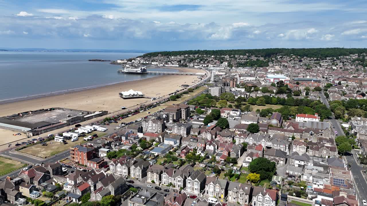 Weston-super-Mare Somerset UK seaside town pull back drone aerial reverse reveal