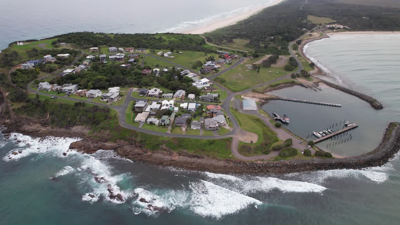 Crowdy Head With Lighthouse And Crowdy Head Boat Harbour In NSW, Australia - Drone Shot