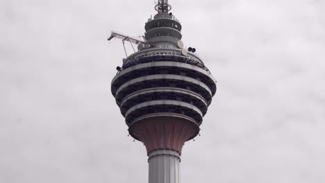 base jumpers jumping from menara tower in kuala lumpur.