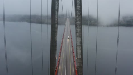 truck going over the big bridge höga kusten in northern part of sweden