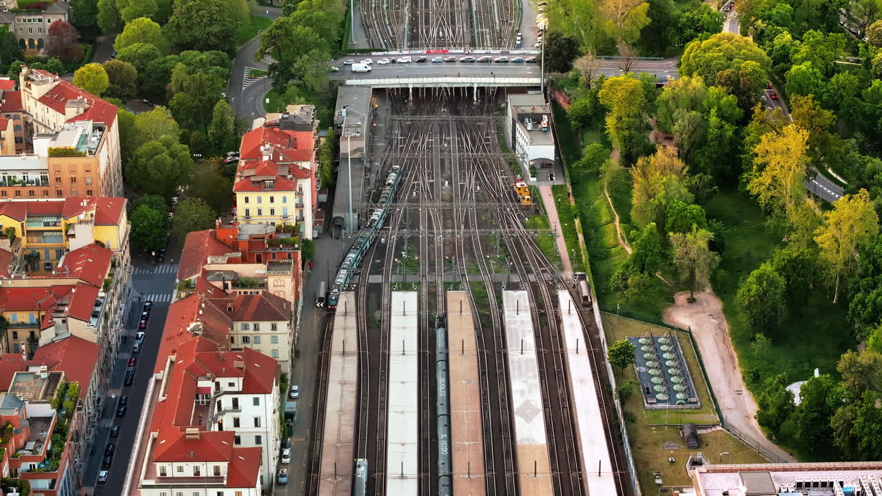 Aerial drone view of a train entering the Milano Cadorna Railway Station, Italy