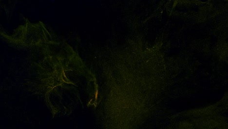 flujo de colores dorados en un fondo negro tridimensional en movimiento, transición.