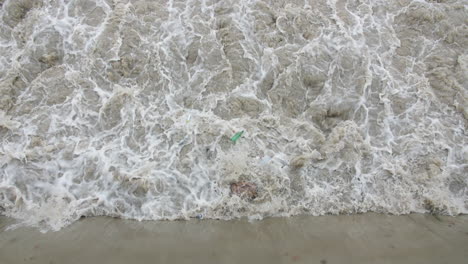 dirty water under bridge in montpellier plastics bottle pollution antigone