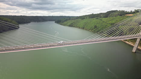 downward dolly aerial view of bridge over water
