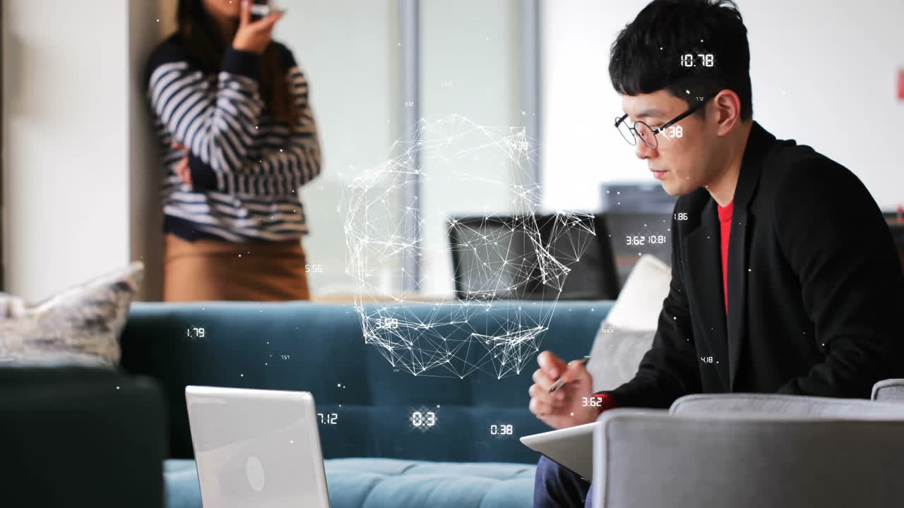 Man working on laptop with network connections animation over office background