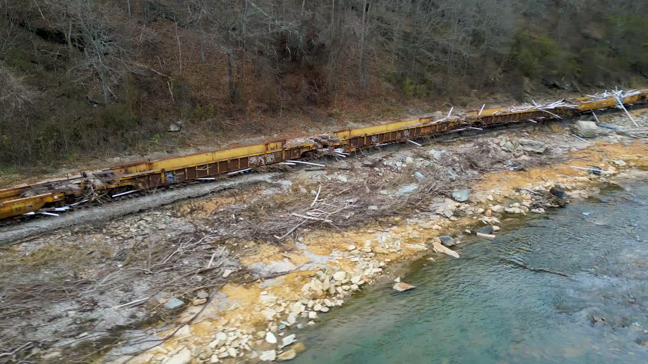 4K Aerial Drone Video of Train Loaded with Debris from Hurricane Helene Stranded on Track Along French Broad River near Marshall, NC (2024)