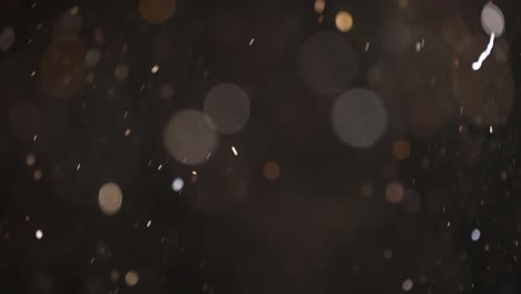 bokeh de partículas abstractas flotantes sobre fondo oscuro