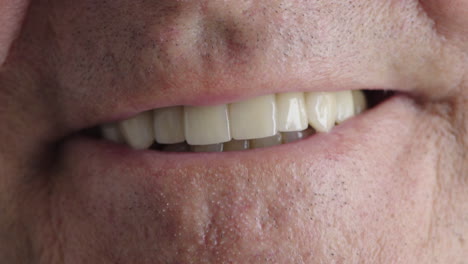 close up of elderly man mouth smiling healthy teeth