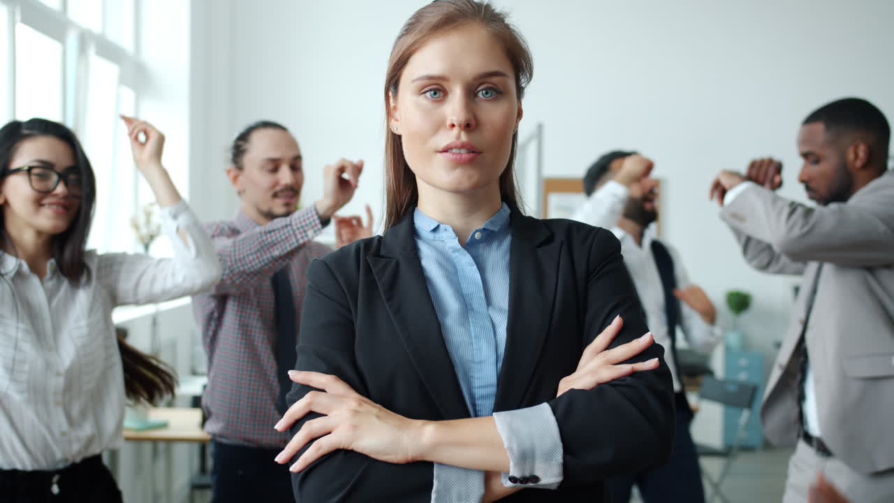 Confident Businesswoman in a Busy Office