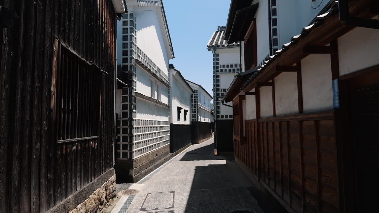 Traditional Japanese white-walled merchant houses in a historic district