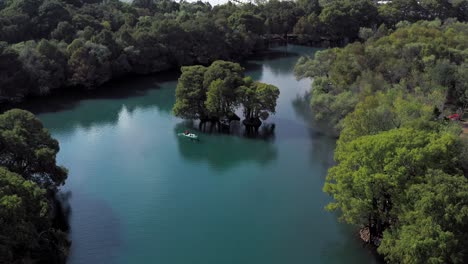 AERIAL:-Lago-De-Camecuaro,-Boat,-Tangancicuaro,-Mexico