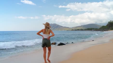 Woman-walking-on-the-beach-4k