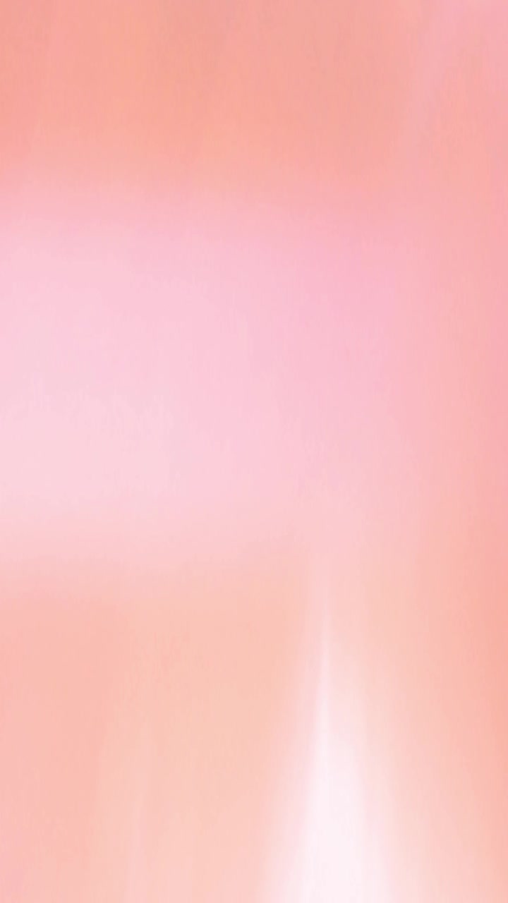 Abstract Background with Soft Pink and Orange Light Leaks