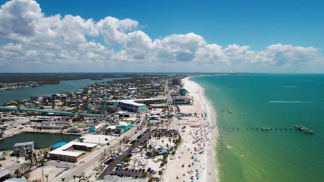 drone shot of the destroyed fort myers pier from a hurricane