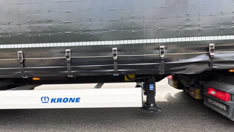 a large truck travels down a birmingham road