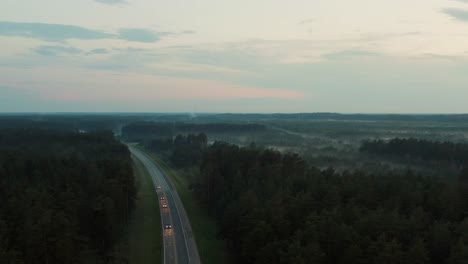 aerial view of a rural landscape with a highway passing through