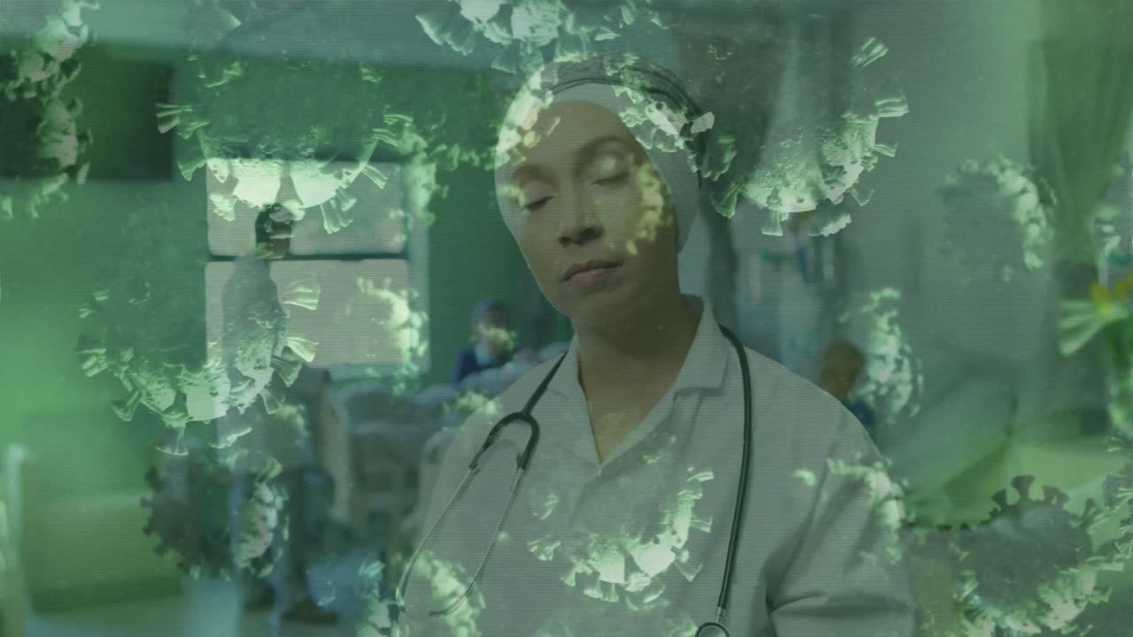 Covid-19 cells against female doctor taking notes in hospital