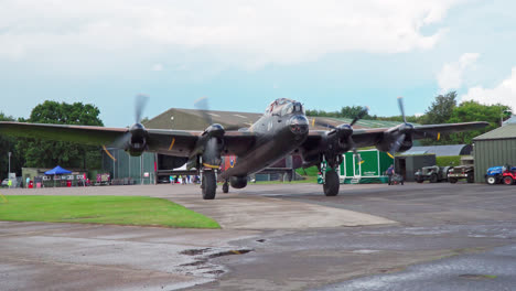 video of the famous second world war lincoln bomber airplane taxing along on a raf air-force base in lincolnshire uk