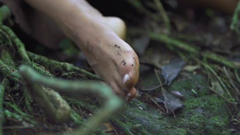 Close up of a girl&#039;s wet feet on the river bank in Salto Encantado park located in Misiones, Argentina