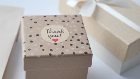 close up of gift boxes with thank you tag