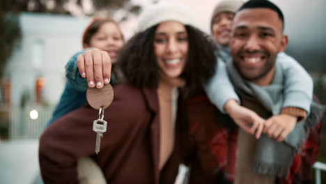 family celebrates buying a new home