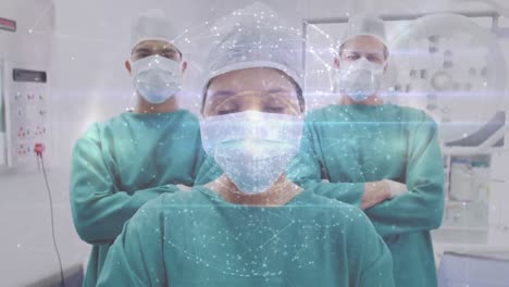 Animation-of-connections-with-globe-over-diverse-surgeons-looking-at-camera