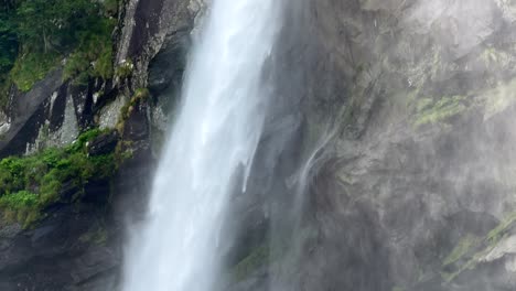 Waterfall-Cascading-Down-Rocks,-Foroglio-Waterfall-In-Switzerland---tilt-up