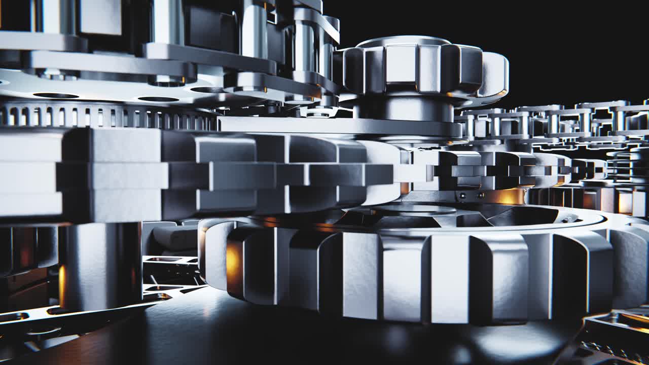 Close-Up of Rotating Metal Gears and Chains