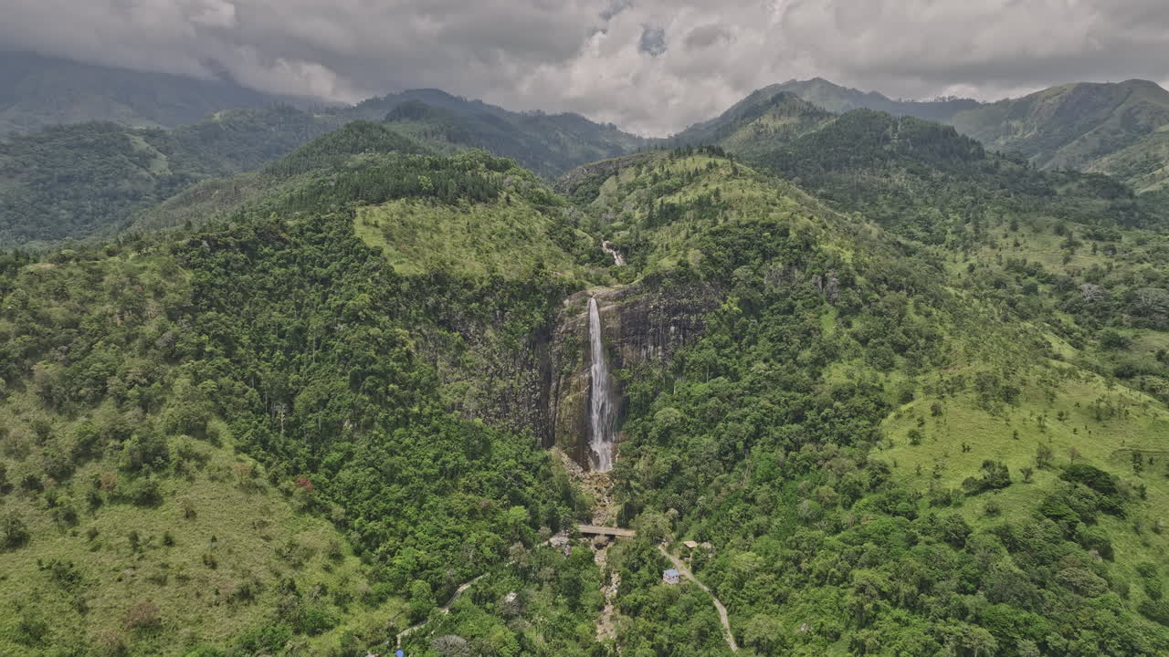 Diyaluma Sri Lanka Aerial v4 flyover verdant valleys capturing breathtaking landscape of epic cliffside falls within lush jungle forests amid rolling mountains - Shot with Mavic 3 Cine - April 2023