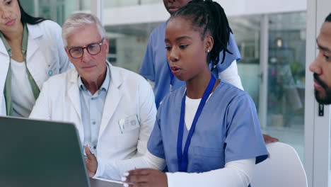 Teamwork,-meeting-and-doctors-with-a-laptop