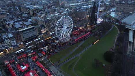 edinburgh city centre christmas market with ferris wheel, 4k aerial footage