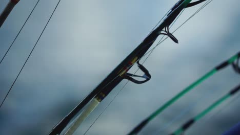 SLOWMO---Close-up-of-fishing-rods-towards-their-tip