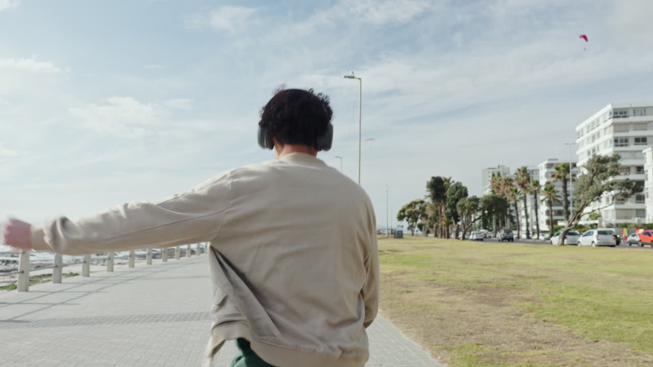 Man walking on sidewalk