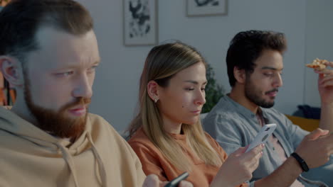 friends relaxing and using smartphones at home